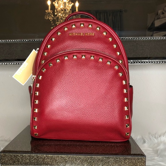 Michael Kors Handbags - Michael Kors Abbey MD frame out studded backpack